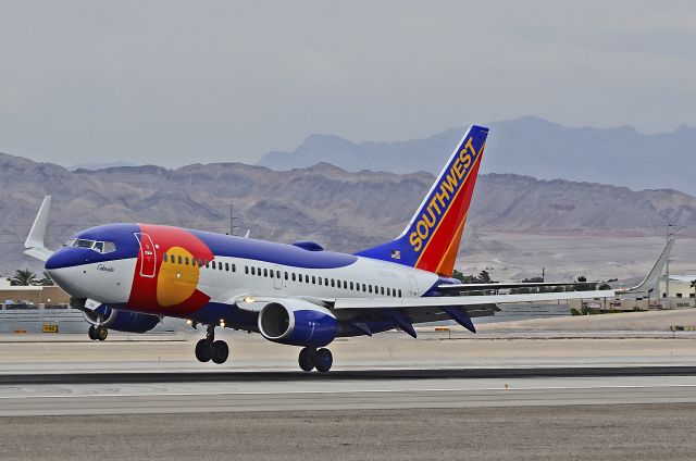 Boeing 737-700 (N230WN) - N230WN  Southwest Airlines 2006 Boeing 737-7H4 (cn 34592/1868)  "Colorado One" - McCarran International Airport (KLAS)br /Las Vegas, Nevadabr /TDelCorobr /October 09, 2013