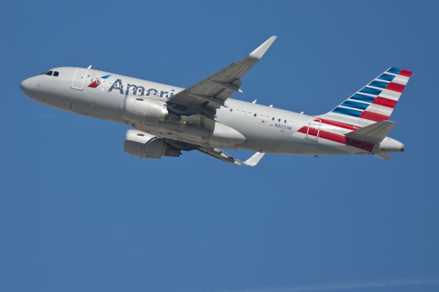 Airbus A319 (N8031M) - Photo taken from hill south of LAX.