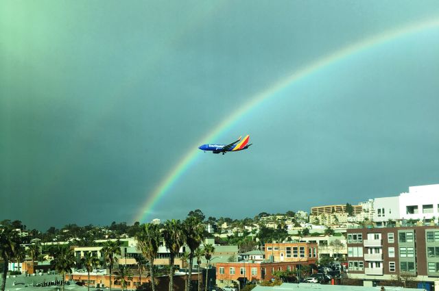 — — - Rain passing on the approach to Lindbergh Field in San Diego. 