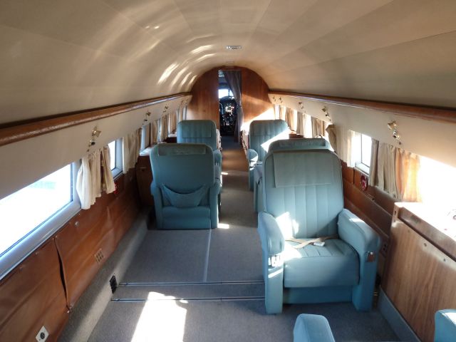 Douglas DC-3 (N877MG) - Historic Flight Foundations DC-3. Corporate interior. Arrived at HF on Thursday, 11/8/12. A new hanger will be built to house this beautiful plane in the near future.