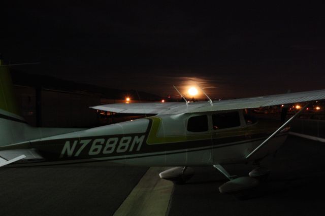 Cessna 175 Skylark (N7688M) - Moon Rise over the Cessna time to put her to bed.