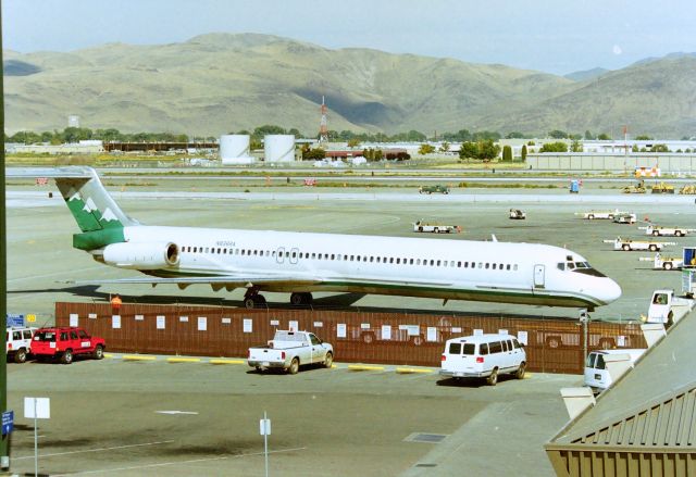 McDonnell Douglas MD-83 (N836RA) - KRNO - Fading fast RenoAir MD-83 now being absorbed by American Airlines in this 1999 view as this jet readied for pushback. If you haven't read TJ Martini's excellent coffee table book "Wings of Pride - The story of Reno Air and it's people" is a must read and keeper, it's chock full of photos....