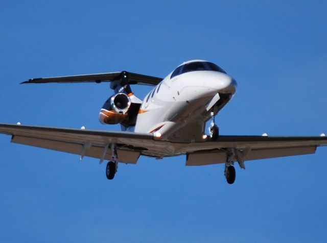 Embraer Phenom 100 (N289EE) - EMBRAER EXECUTIVE AIRCRAFT INC on final for runway 2 at KJQF - 5/25/13