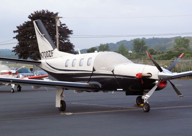 Socata TBM-700 (N700ZF) - A fast aircraf on the RELIANT AIR ramp. RELIANT AIR has the lowest fuel price on the Danbury (KDXR) airport.