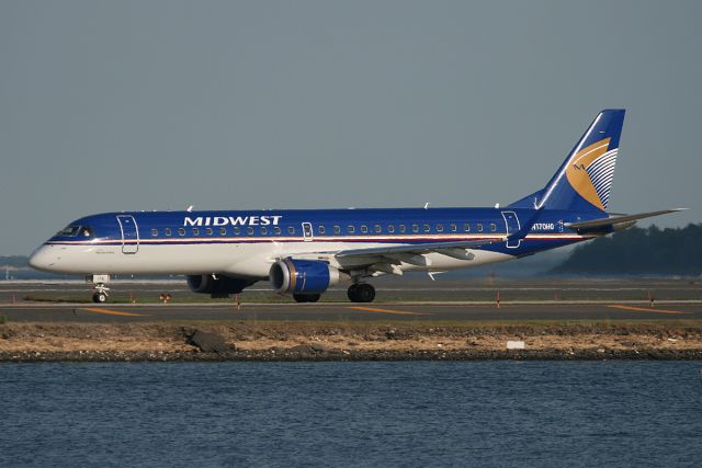 Embraer ERJ-190 (N170HQ) - Midwest E190 taxiing on 'November' to runway 22R for departure. May 20, 2010