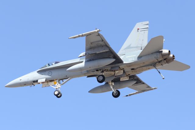 — — - RAAF, F-18 Classic Hornet, approaches runway 01 with arrestor hook deployed as part of a training flight.