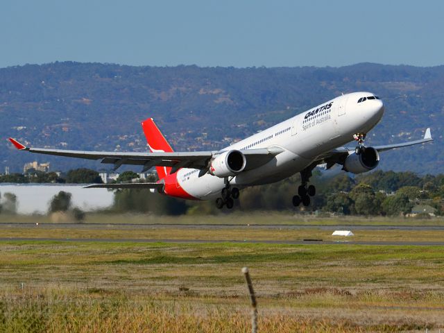 Airbus A330-300 (VH-QPI) - Getting airborne off runway 23, for flight to Singapore. Thursday 12th April 2012.