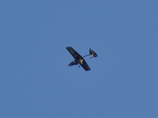 G-SNEV — - CFM Streak Shadow SA G-SNEV flying over Weymouth