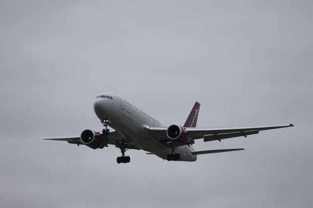 BOEING 767-200 (N207AX) - National Guard-chartered Omni Air 767-200 roars onto RWY 23R