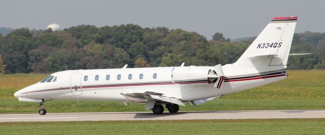 Cessna Citation Sovereign (N334QS) - Landing rwy 27 on 9/26/12....