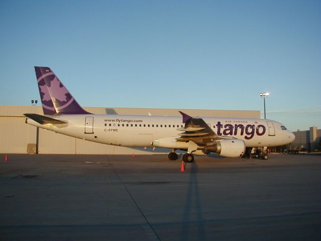 Airbus A320 (C-FPWE) - One of the first Tango branded aircraft in 2003 in Denver on a NHL Charter.