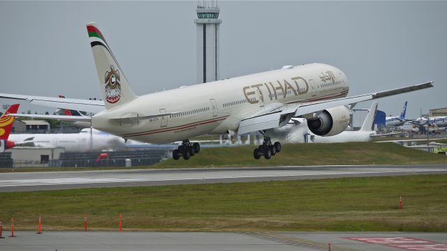 BOEING 777-300 (A6-ETP) - BOE94 on final to runway 16R to complete a flight test on 6/23/13. (LN:1111 cn 41699).