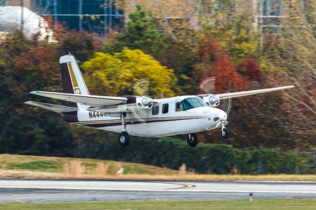 Aero Commander 500 (N444CA) - This photo is of a 1964 Aero Commander departing Atlanta's PDK executive airport on a beautiful fall afternoon. I shot this with a Canon 500mm lens. Camera settings were 1/250 shutter, F16, ISO 500. Please check out my other aviation photography. Votes and positive comments are always appreciated. Questions about this photo can be sent to Info@FlewShots.com