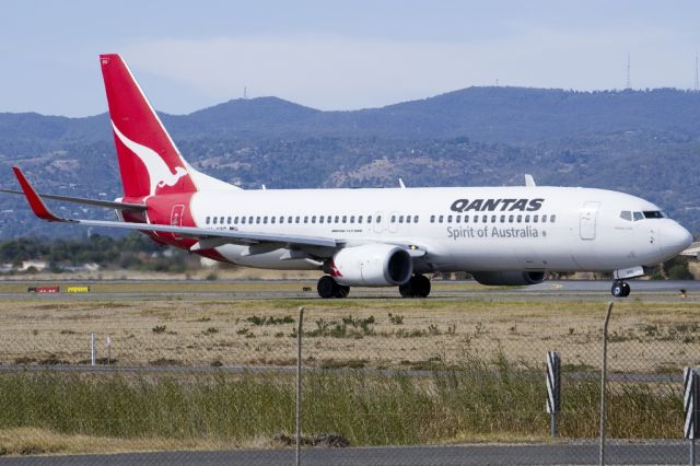 Boeing 737-800 (VH-VYC) - On taxi-way heading for take off on runway 05.Friday 19th April 2013.