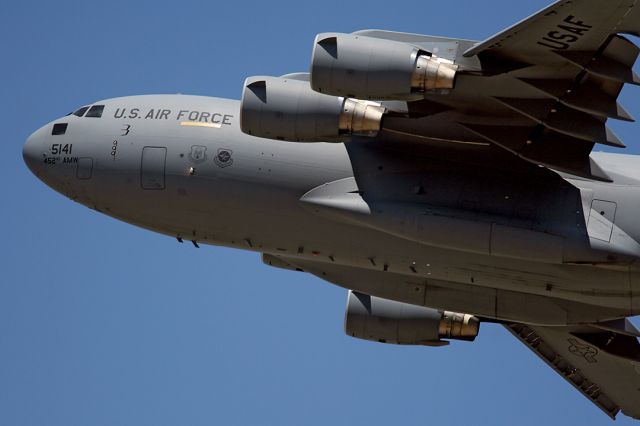 N055141 — - A Boeing C-17A Globemaster III climbing out while doing touch and goes @ March ARB, Riverside, CA.