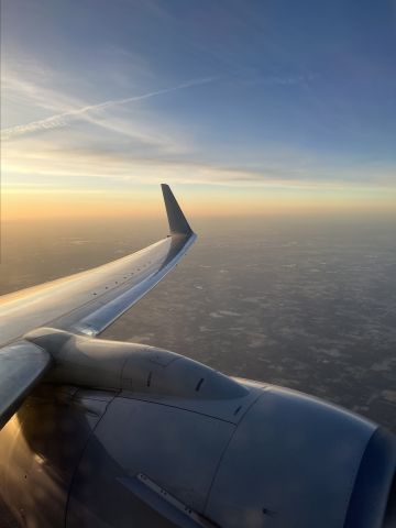 Boeing 737-800 — - Beautiful sunrise flight from Detroit to Phoenix “ I’ve never seen a better sunrise”.
