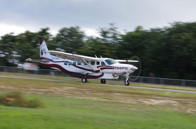 V3-HHC — - Tropic Air Cessna Caravan taking off from Placencia in southern Belize.