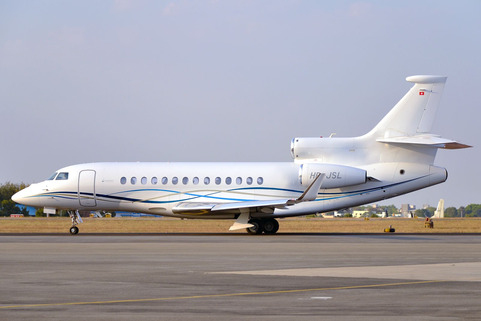 HB-JSL — - Taxiing out in the evening for a customer demo flight at Aero India 2015.