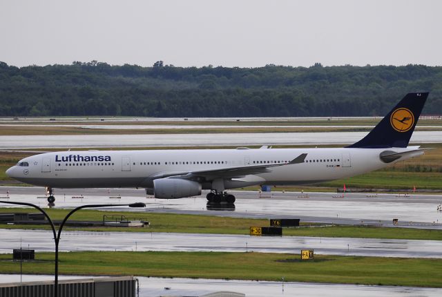 Airbus A330-300 (D-AIKJ) - Seen at KIAD on 7/25/2009.  Dark overcast, light rain.