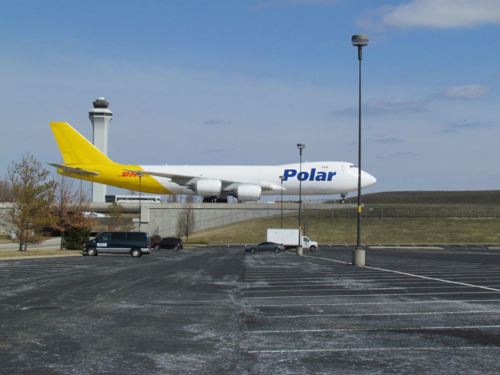 BOEING 747-8 (N853GT) - Boeing 747-8 ran by Polar Air Cargo, taxing by the Tower after landing on 36C and heading to the DHL warehousebr /br /Taken from the DHL parking lot on 03/23/2014