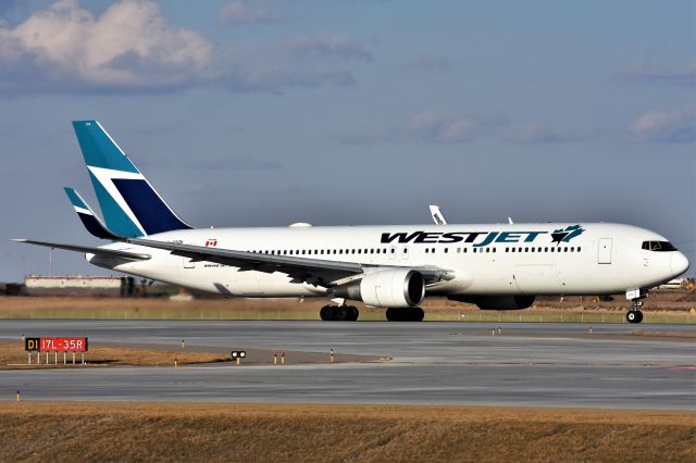 BOEING 767-300 (C-GOGN) - Westjet Boeing 767-338(ER) departing YYC on Apr 12.