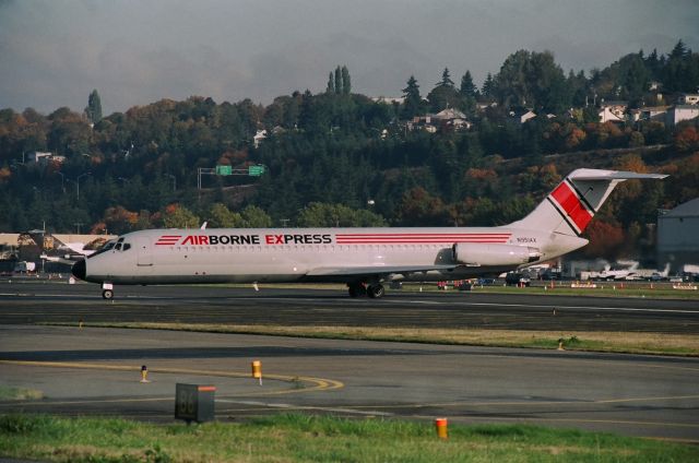 N951AX — - KBFI Jan 2005 with Airborne Express DC-9 rolling to departure. ...Pre 1964, I used to live above and to the left of the freeway signs - there were few trees back then, I-5 was built and the State demolished the house for the right of way.