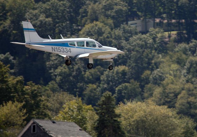 Piper Cherokee Arrow (N15334) - Perfect approach and landing under difficult wind conditions, runway 26.