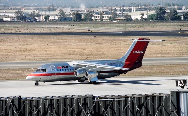 British Aerospace BAe-146-200 (N163US) - KSJC - BAe-146 N163US rolls to Gate A3 at San Jose in the early 1990s.br /br /Serial number 2022 LN:22br /Type Bae 146-200br /First flight date 16/05/1984