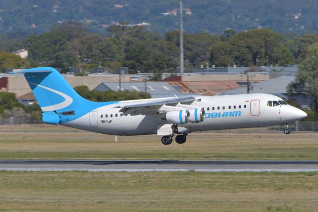 Avro RJ-100 Avroliner (VH-NJP) - Feb 5, 2020. Taken from inside the terminal, landing on runway 23.