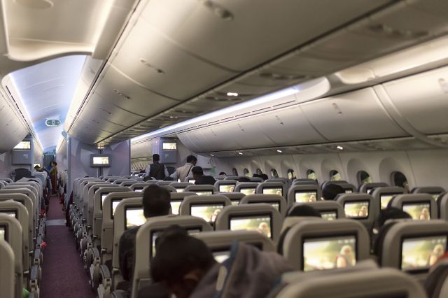 Boeing 787-8 (S2-AJU) - 3-3-3 seating configuration in the rear economy class on-board Biman's newest and three month old Boeing 787-800 (S2-AJU) as we reach the end of the 3 hour 15 min Dhaka-Kuala Lumpur night flight. Photograph: 25th Dec., 2019. (See http://www.planexplorer.net/Xploregallery/displayimage.php?pid=1628 )