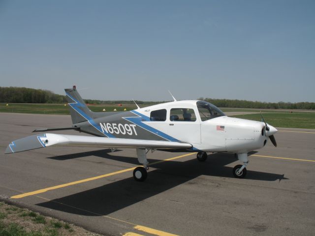 Beechcraft 19 Sport (N6509T) - On the ground at the Dowagiac Municipal Airport (C91) awaiting the use of the self-service fuel pump in May 2008.  I sure miss those days of $2.95 a gallon fuel.  On this day fuel was $4.60.