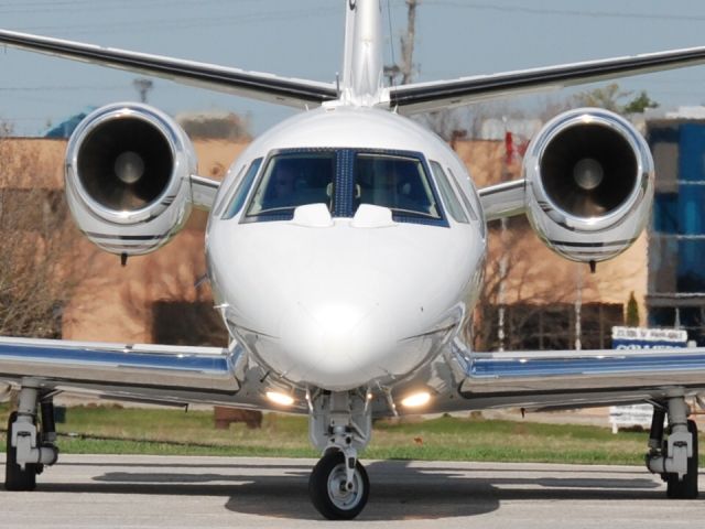 Cessna Citation Excel/XLS (ASP234) - Citation XL turning onto runway at Torontos Buttonville Airport.  April 11/10.