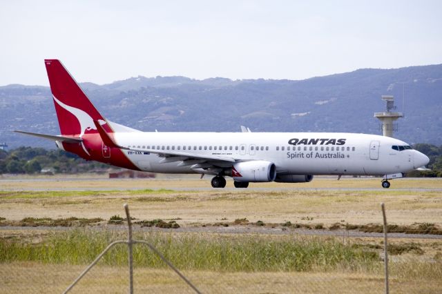 Boeing 737-800 (VH-VXK) - On taxi-way, heading for take off on runway 05. Friday, 19th April 2013.