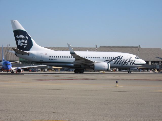 Boeing 737-700 (N617AS) - Holding on RWY 19R