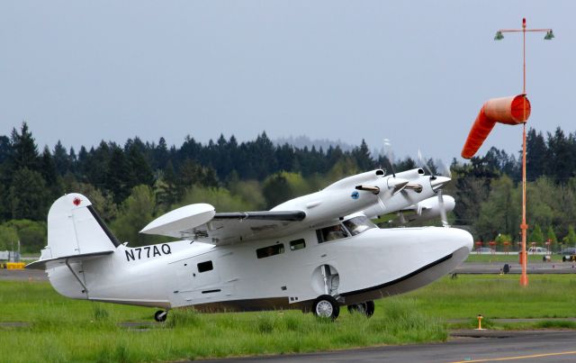 McKinnon Turbo Goose (N77AQ) - McKinnon Turbo Goose (twin-turboprop) arriving KHIO, Hillsboro Oregon after landing RWY 31.