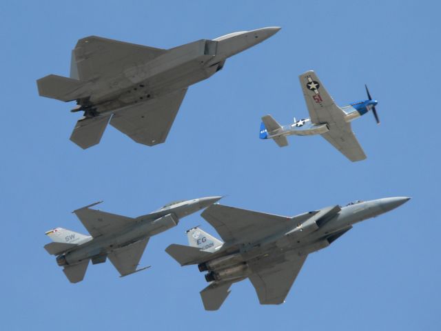 — — - Heritage flight comprising F-15, F-16, F-22 & P-51. September 30, 2007.