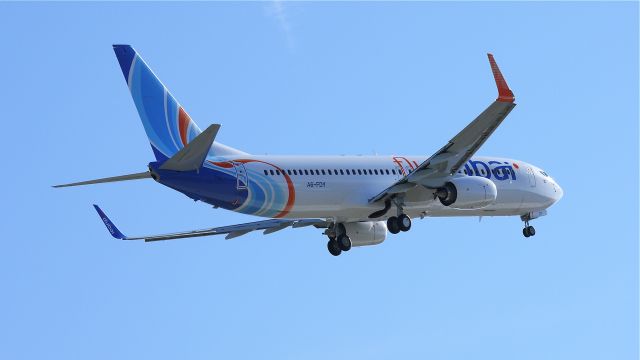 Boeing 737-800 (A6-FDY) - BOE16 flies a missed approach over runway 16R on 2/6/12. (LN:3923 cn 40252).