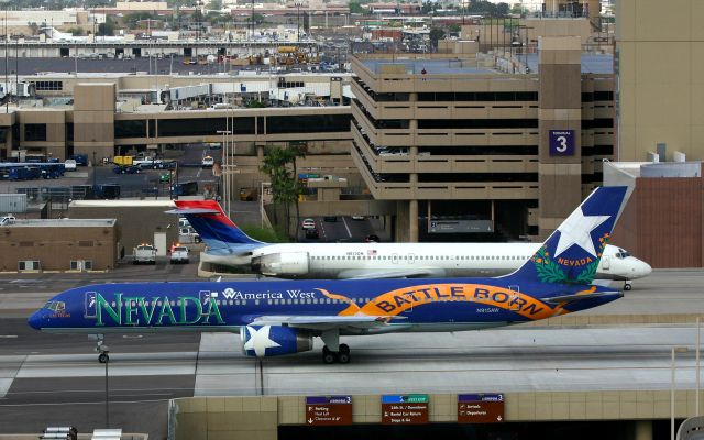 Boeing 757-200 (N915AW) - KPHX - N915AW & N913DN along with a spotter on the other parking structure and me on my vantage point - I hope the photographer on the other side posts his picture of the opposite side. Weird that the Reg numbers were almost the same.