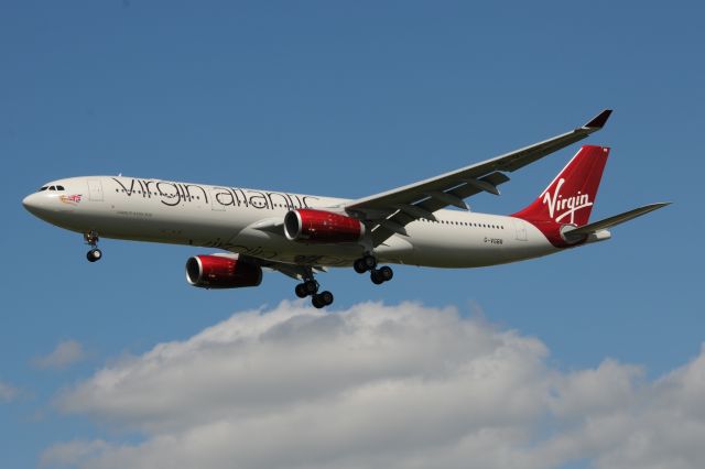 Airbus A330-300 (G-VGBR) - Wow! Those new color's really "pop" in person. The picture does not do it justice.