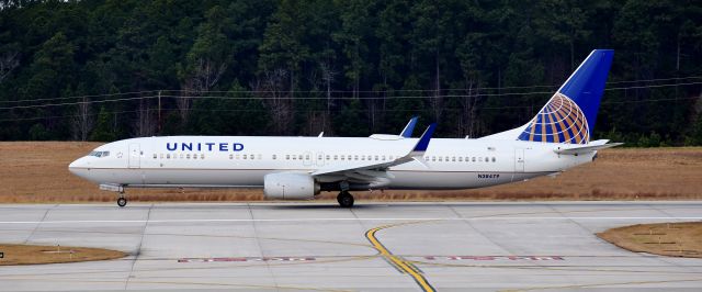 Boeing 737-900 (N38479) - From the RDU observation deck, 12/23/17.