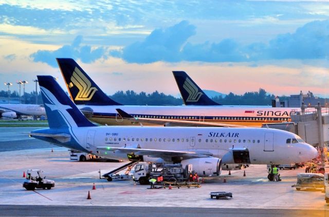 Airbus A319 (9V-SBG) - At sunrise