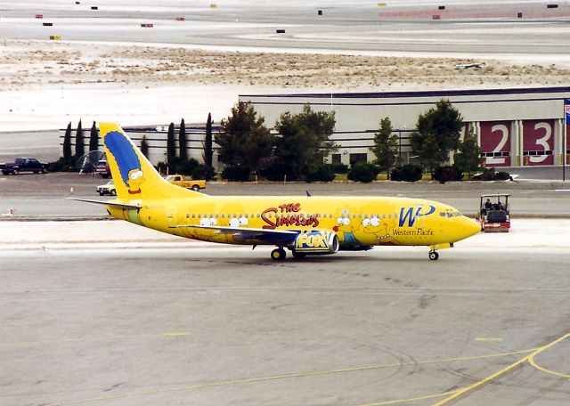 BOEING 737-300 (N949WP) - KLAS - Western Pacific logojet arriving at Las Vegas - this was the 1st time I saw this jet at an airport - I never saw it at KSJC.