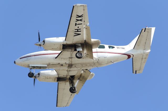 Piper Navajo (VH-TXK) - A Piper PA-31-350, on short finals.