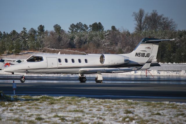 Learjet 31 (N518JG) - Parked at Concord Regional Airport - 3/2/09 Registered Owner:  Joe Gibbs Racing Inc