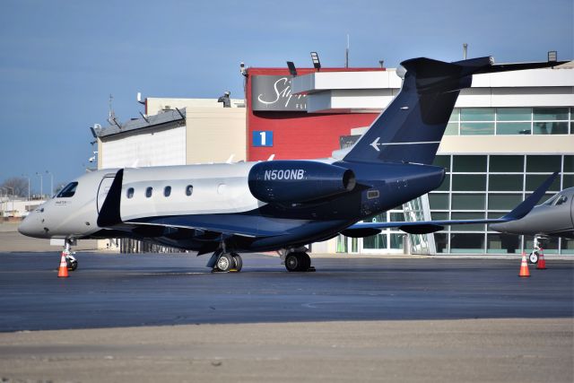 Embraer Legacy 450 (N500NB) - 11-29-21. Owned by Old National Bank, an Indiana company. First pic of this reg # on this aircraft on the database. Amazing how many aircraft that come through IND have "500" in their reg #. At least 8 I know of.