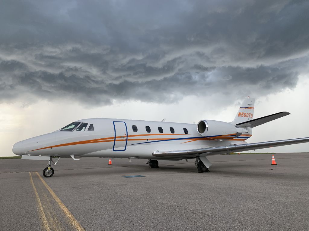 Cessna Citation Excel/XLS (N560TD) - Enjoying a little ramp time as a line passes over. 