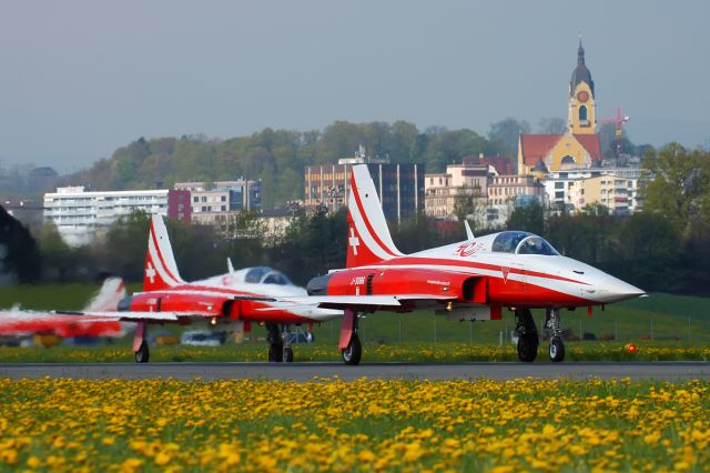 Northrop RF-5 Tigereye (J3086) - Colorful day at Emmen Air Base near Lucerne - Patrouille Suisse lining up just before front gear extension (optimizes of Takeoff lenght). J-3086 crashed June 9th, 2016 near Leeuwarden Air Base in the Netherlands.