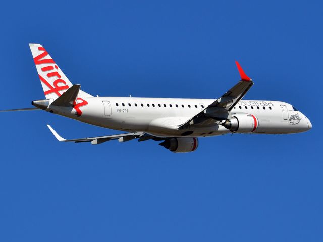 Embraer ERJ-190 (VH-ZPT) - Getting airborne off runway 23 on a beautiful Adelaide autumn day. Thursday 12th April 2012.