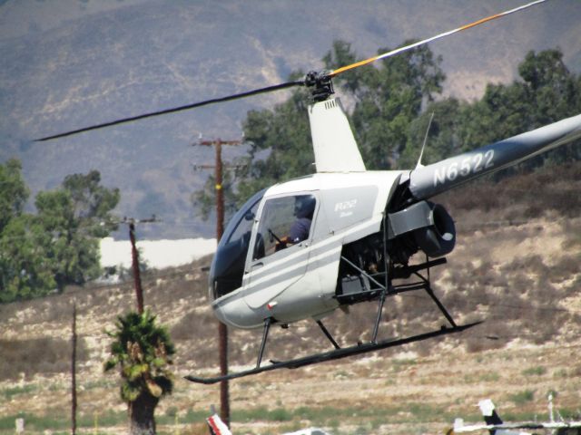 Robinson R-22 (N6522) - Lifting off RWY 26L