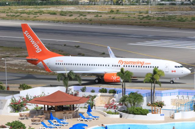 Boeing 737-800 (C-FYJD) - Sunwing departing St Maarten